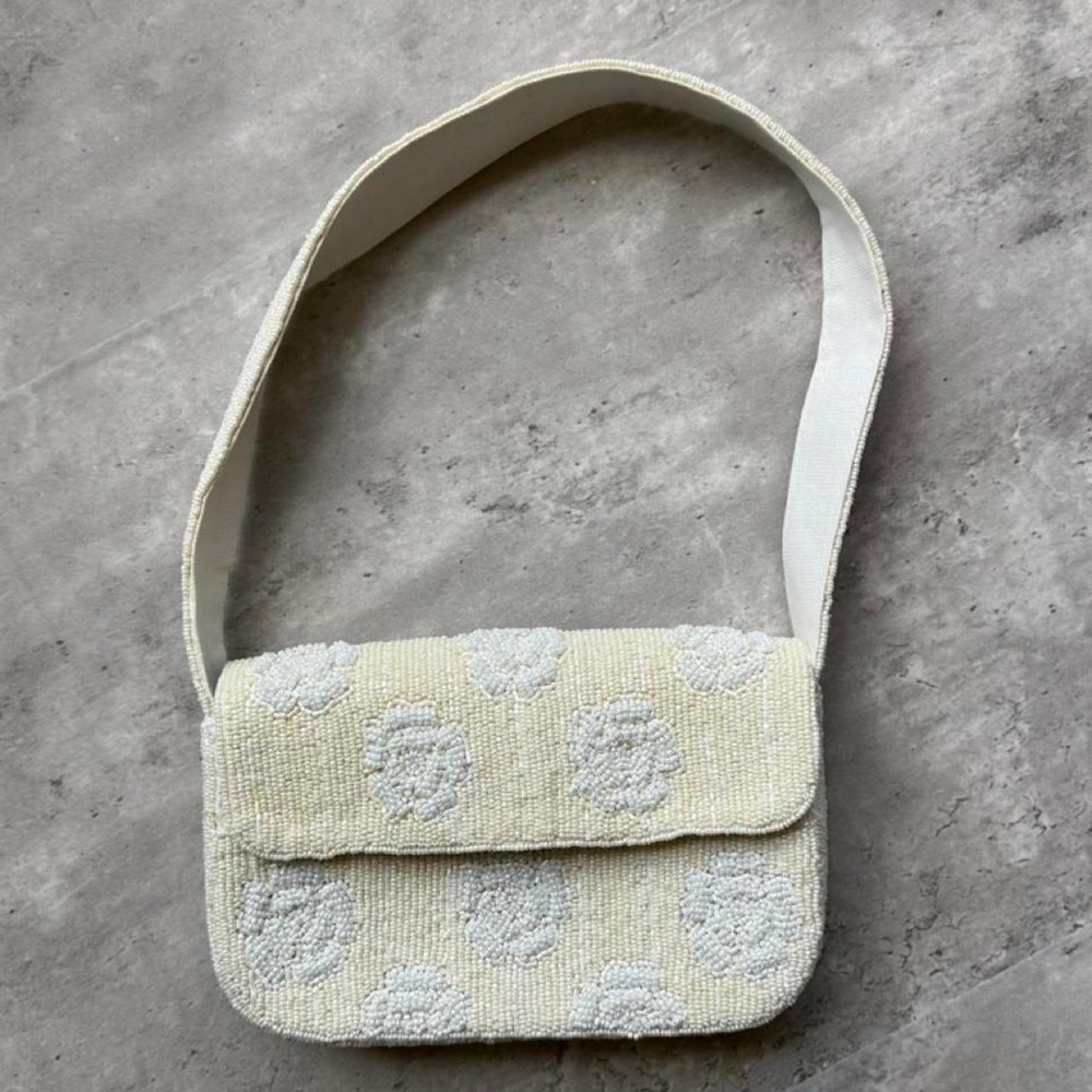 Cream beaded purse with white floral embroidery